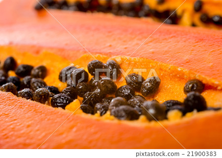 close up fresh slices papaya seeds in the fruit 21900383