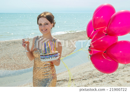 woman with balloons on the sea woman with balloons on the sea 21900722