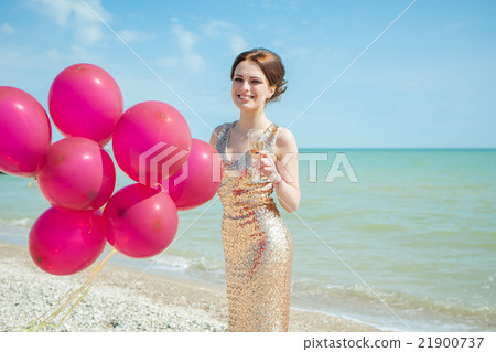 woman with balloons on the sea woman with balloons on the sea 21900737
