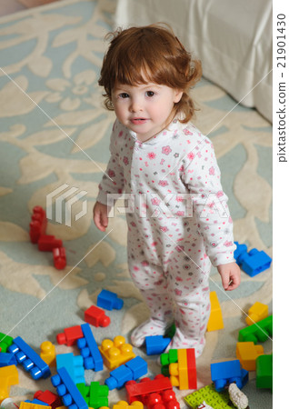 Cute baby playing on floor. Cute baby playing on floor. 21901430