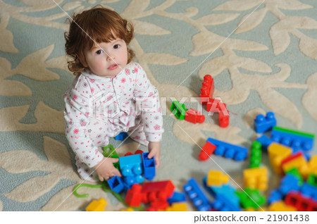 Cute baby playing on floor. Cute baby playing on floor. 21901438