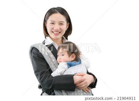 A young mother in the business suits holding an infant 21904911