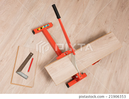 Red tool for cutting laminate 21906353