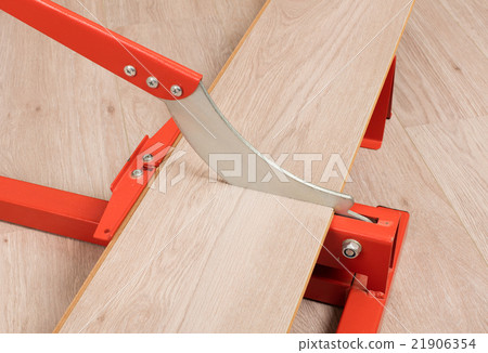 Red tool for cutting laminate Red tool for cutting laminate 21906354
