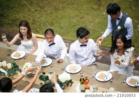 A newlywed couple doing a house wedding A newlywed couple doing a house wedding 21910053