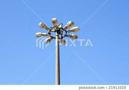 Modern street lamp over blue sky Modern street lamp over blue sky 21911028