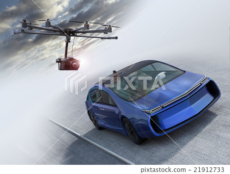 Blue car tracked by aerial shooting drone 21912733