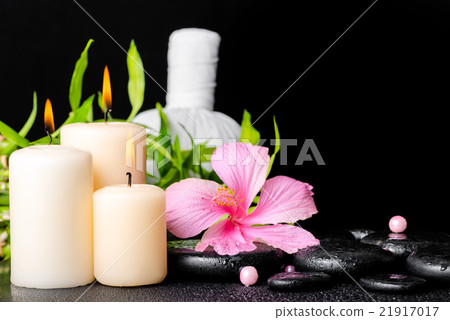 spa setting of hibiscus flower, twig bamboo, 21917017