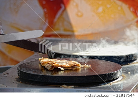 Cooking pancakes on fair Cooking pancakes on fair 21917544