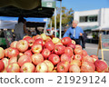 Red apples sold in the blue sky market 21929124