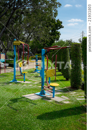 fitness gears in public garden 21931803