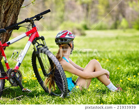 Bikes cycling girl wearing helmet. Girl in cycling Bikes cycling girl wearing helmet. Girl in cycling 21933939
