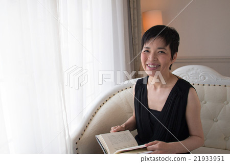 A woman reading A woman reading 21933951