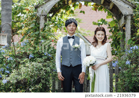 A newlywed couple doing a garden wedding 21936379