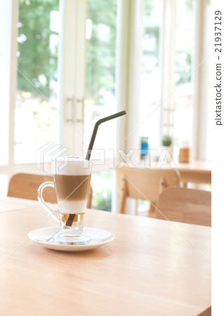 Cup of Hot  Latte Coffee on wood table 21937129