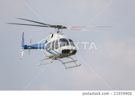 Helicopter in flight. 21939908