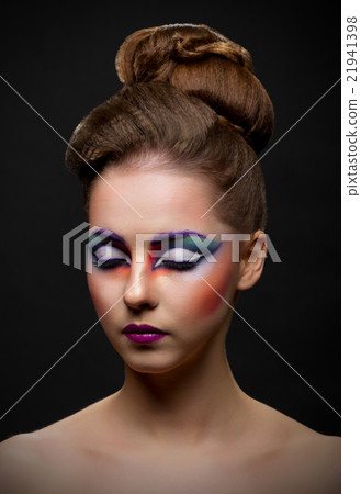 Portrait of young girl with face painting Portrait of young girl with face painting 21941398