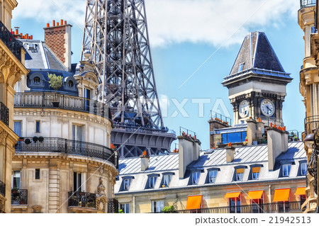 Paris rooftops against a backdrop of Eiffel Tower Paris rooftops against a backdrop of Eiffel Tower 21942513