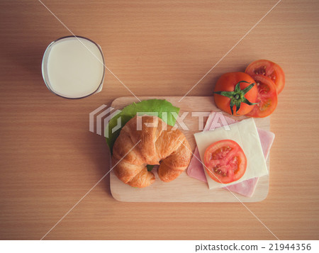 Croissant ham cheese with milk Croissant ham cheese with milk 21944356