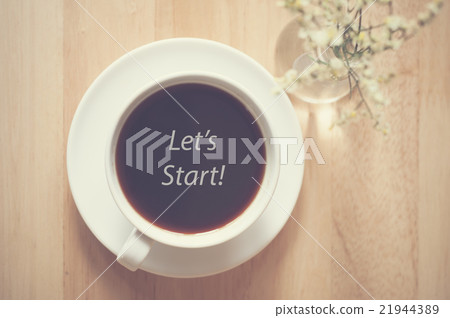 Coffee black espresso on wood table Coffee black espresso on wood table 21944389