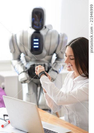 Nice girl sitting at the table  21946999