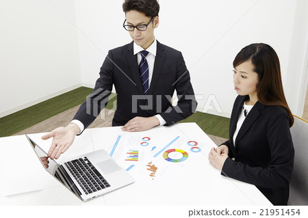 Business meeting Young man and woman meeting room 21951454