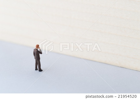Image of a businessman hitting a wall Image of a businessman hitting a wall 21954520