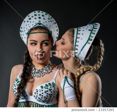 Portrait of two beautiful dancers in sexy costumes 21957265