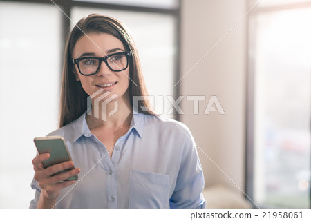Nice girl using cellphone 21958061