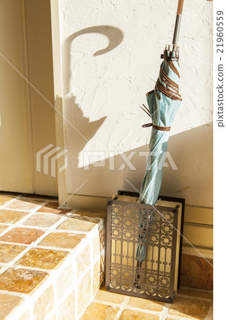 Umbrella stand at the entrance Umbrella stand at the entrance 21960559
