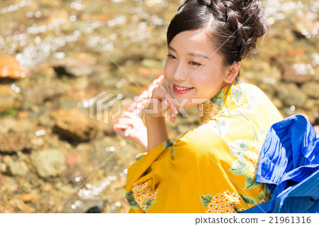 A woman in a yukata A woman in a yukata 21961316