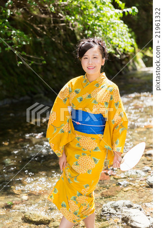 Female whole body wearing a yukata Female whole body wearing a yukata 21961322
