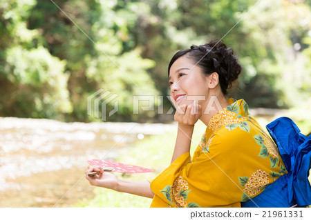A woman in a yukata A woman in a yukata 21961331