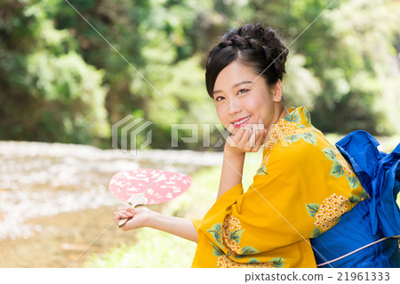 A woman in a yukata A woman in a yukata 21961333