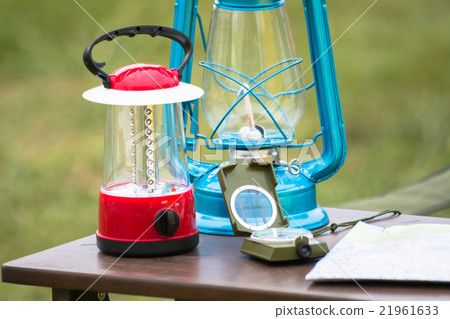 planning in mountain Table use map, lamp and compa planning in mountain Table use map, lamp and compa 21961633