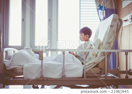 Asian child admitt at hospital with infusion pump 21961645