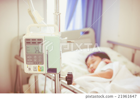 Asian boy with saline intravenous. Health care. Asian boy with saline intravenous. Health care. 21961647