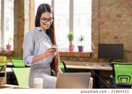 Nice girl working in the office Nice girl working in the office 21964333