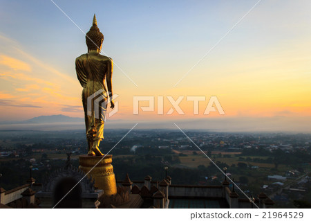Golden buddha statue in Khao Noi temple Golden buddha statue in Khao Noi temple 21964529