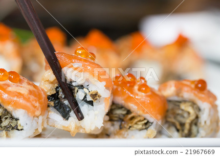 Sushi salmon roll with chopstick 21967669