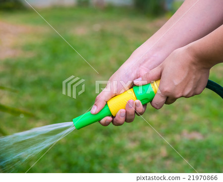 watering the garden. watering the garden. 21970866
