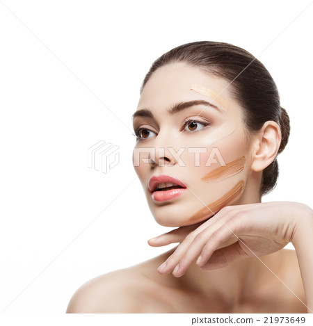 Girl with foundation cream on face Girl with foundation cream on face 21973649
