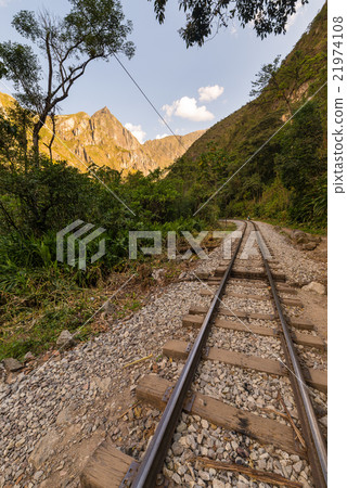 Railway track and Machu Picchu mountains, Peru Railway track and Machu Picchu mountains, Peru 21974108