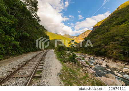 Railway track and Machu Picchu mountains, Peru 21974111
