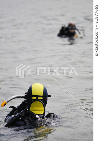 Lake divers on a surface 21977065