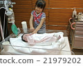 0 days after birth Baby girls birth Sister hands 21979202