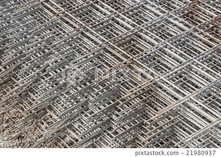 Stacked rebar grids at the construction site 21980937
