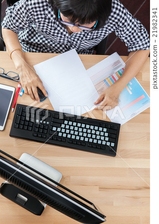top view of working woman 21982341