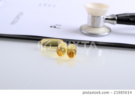 Yellow pills and phonendoscope with prescription Yellow pills and phonendoscope with prescription 21985014