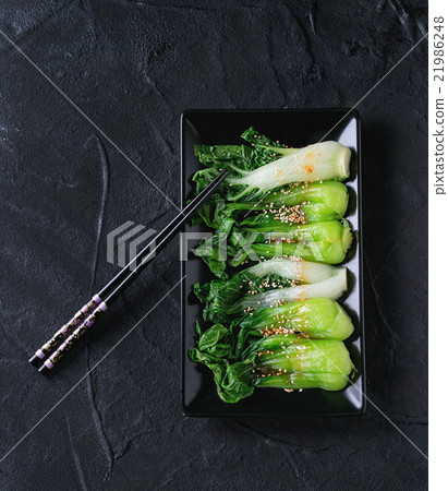 Cooked bok choy with sesame seeds 21986248